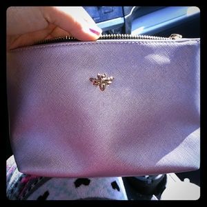 Free *Cosmetic bag* with New tote purchase!!!